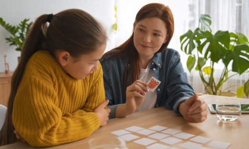 medium-shot-woman-girl-playing-memory-game